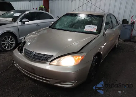 2003 Toyota Camry Le from USA, damaged, VIN JTDBE32K030158451